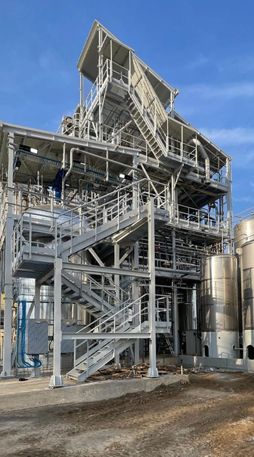 Struttura impianto produzione resina con scale e piping COIM 2005