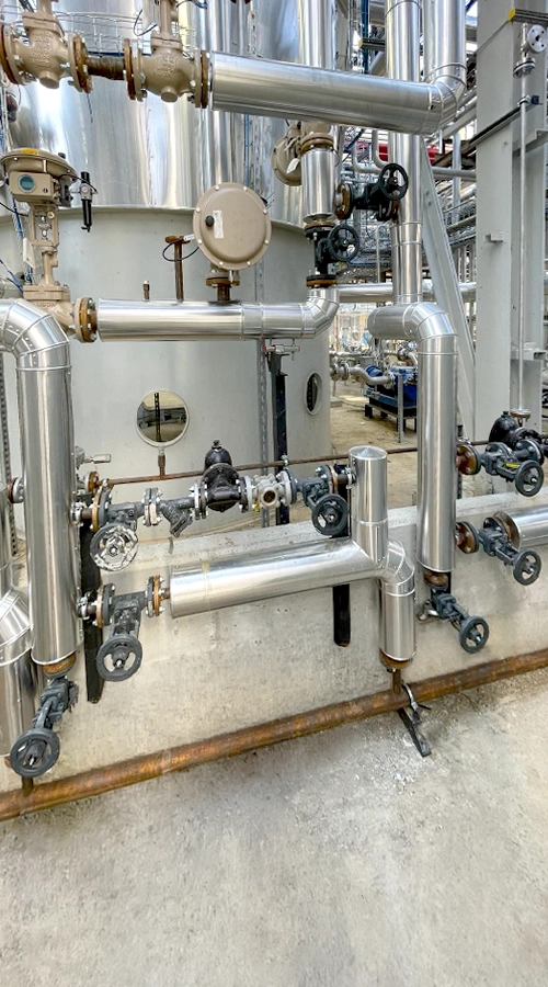 Impianto produzione resina con piping e valvole di regolazione COIM 2005
