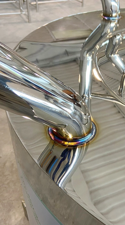 Saldatura TIG su acciaio inox con finitura lucida e cordone uniforme COIM 2005
