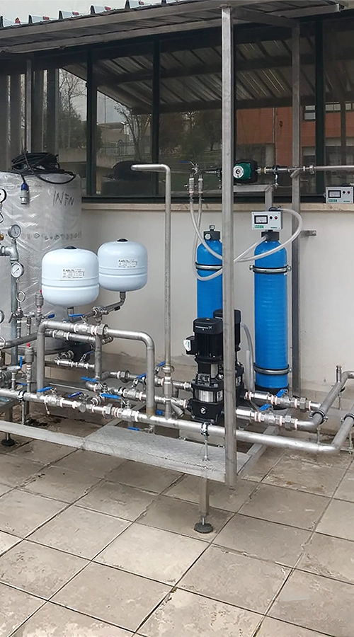 Skid per trattamento acqua con piping in acciaio inox realizzato da CO.I.M.